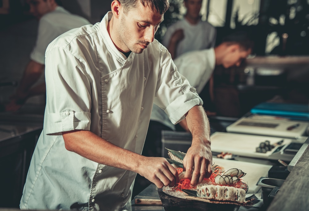 Mechanical sushi sous chef makes rolls fast