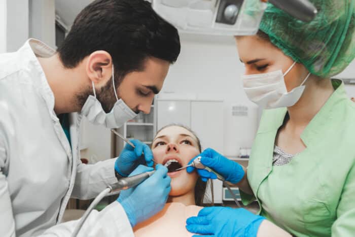 dental assistant with dentist