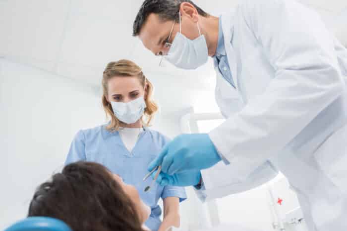 Dental assistant during treatment