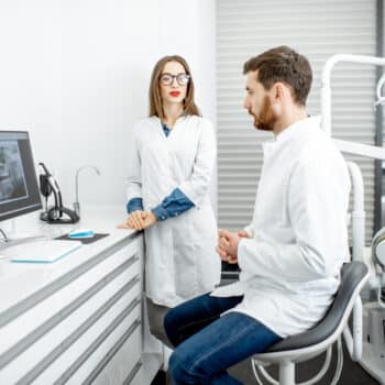 dental assistant with dentist during training