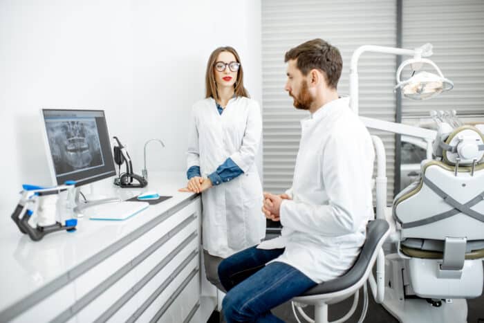 dental assistant with dentist during training