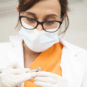 lead dental assistant performing duty