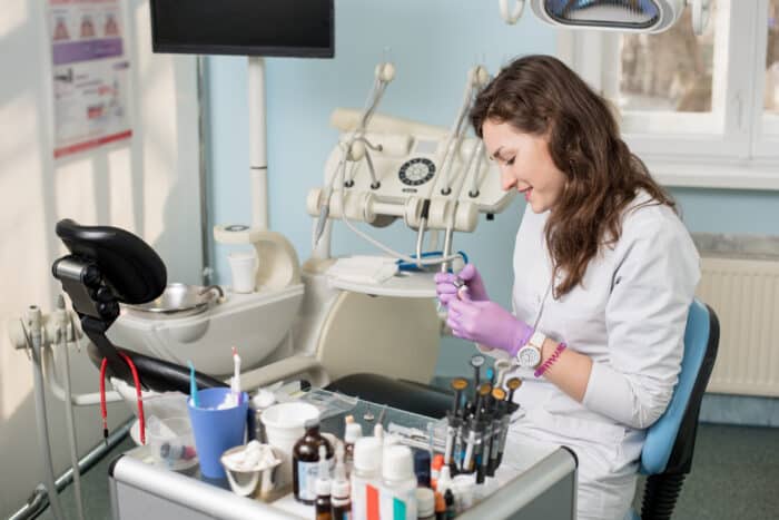 young female expanded dental assistant.